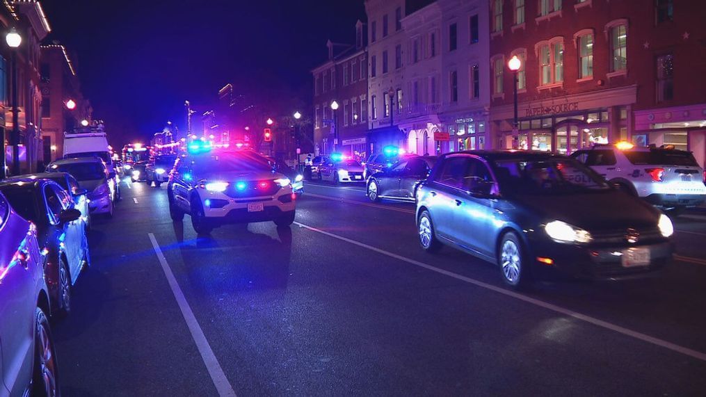 A large police presence in the Georgetown neighborhood of Washington D.C. after a white Jeep was stolen with a baby inside (Andrew Wafford/7News)